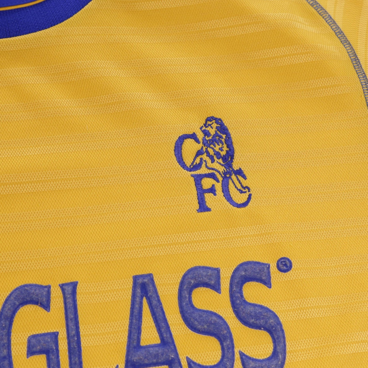 Close-up of Chelsea crest embroidery on chest