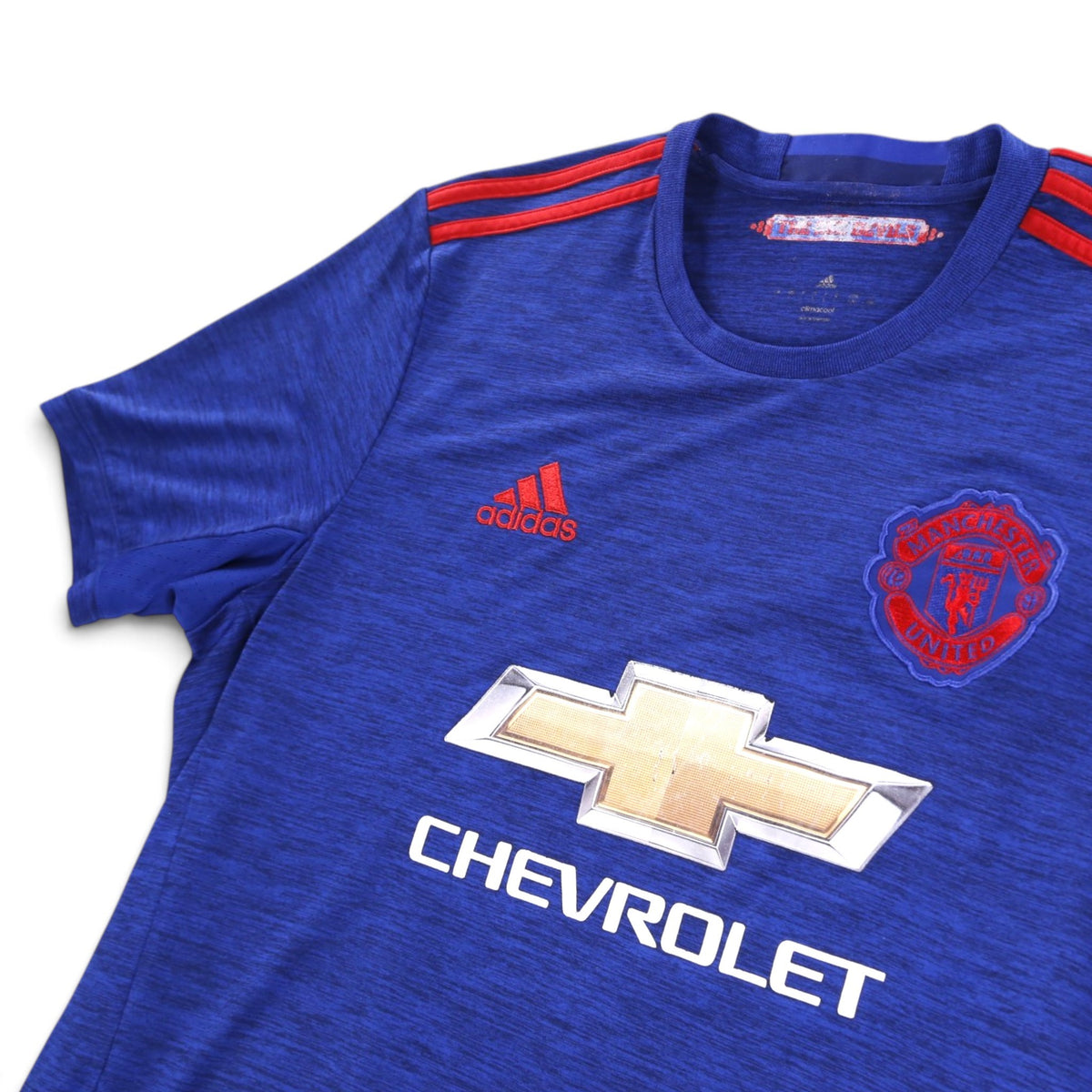 Close-up of collar and adidas Climacool neck label on Manchester United away shirt