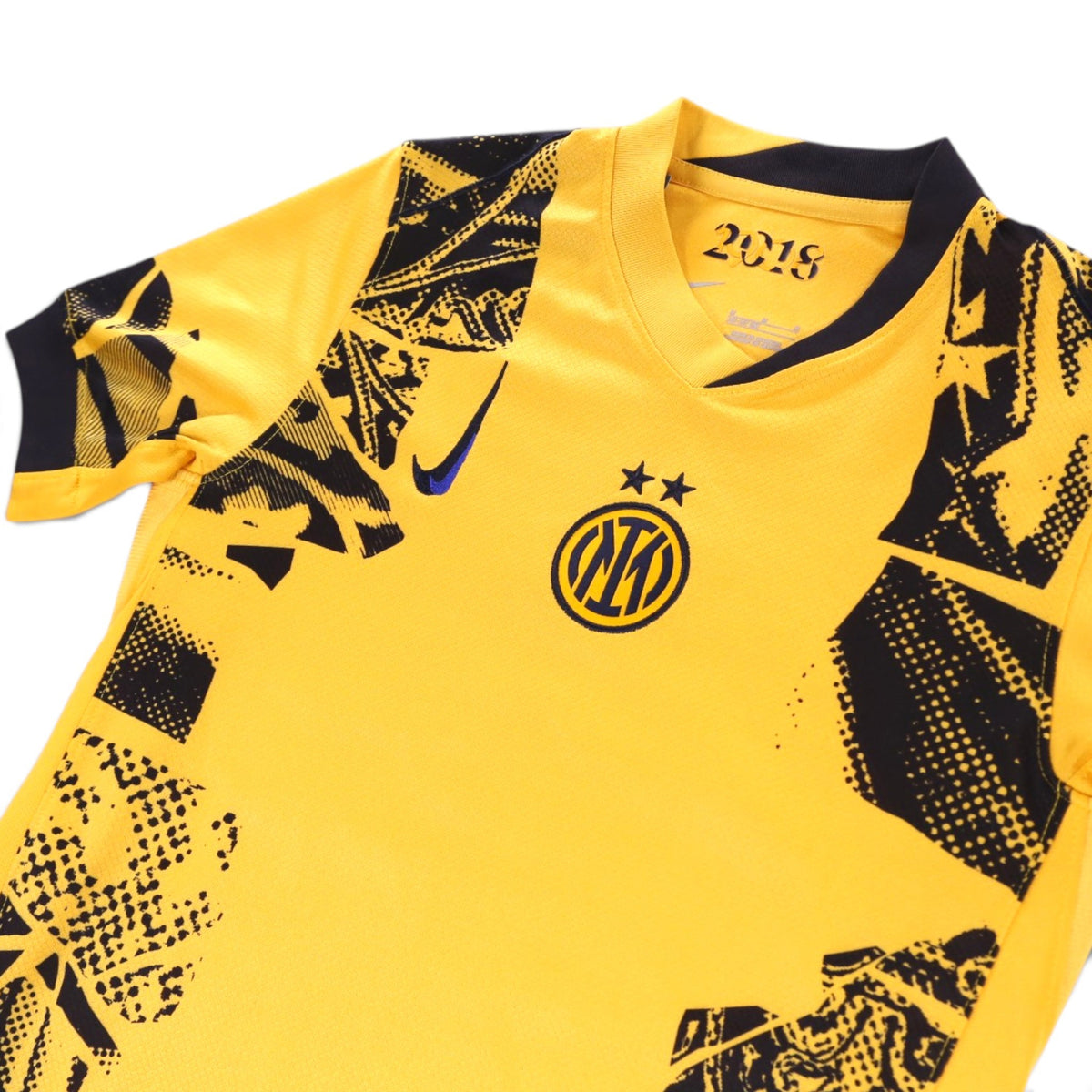 Close-up of Inter Milan third shirt collar and crest showing Nike logo and 2018 print inside collar