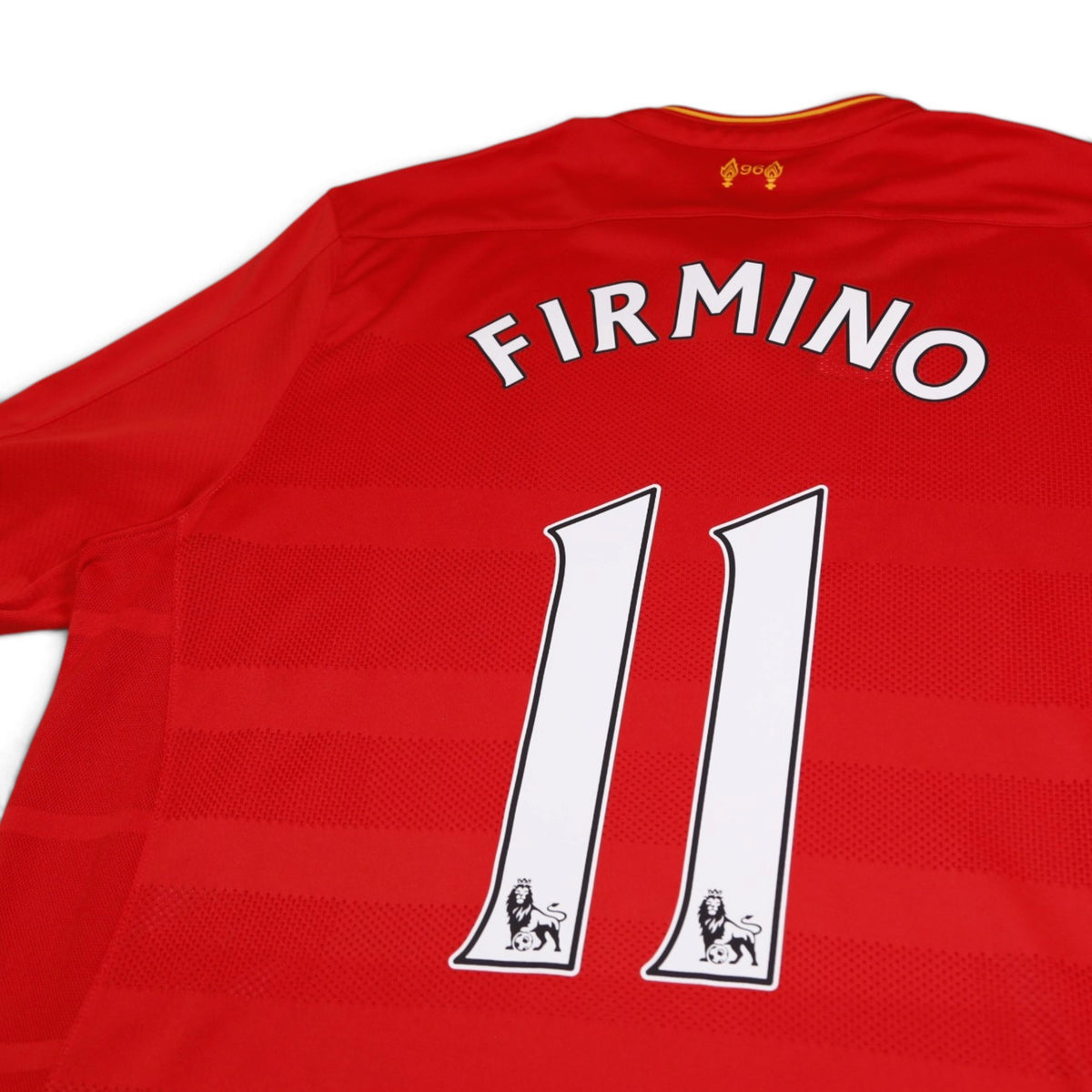 Close-up detail of Firmino name and number 11 on Liverpool 2016/17 home shirt