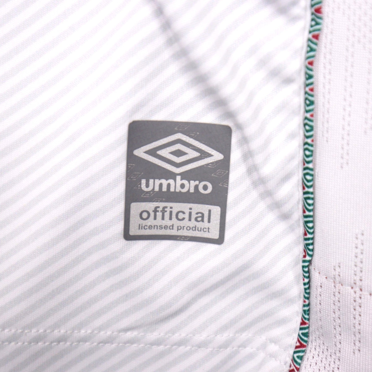 Inner tag showing Umbro official licensed product label