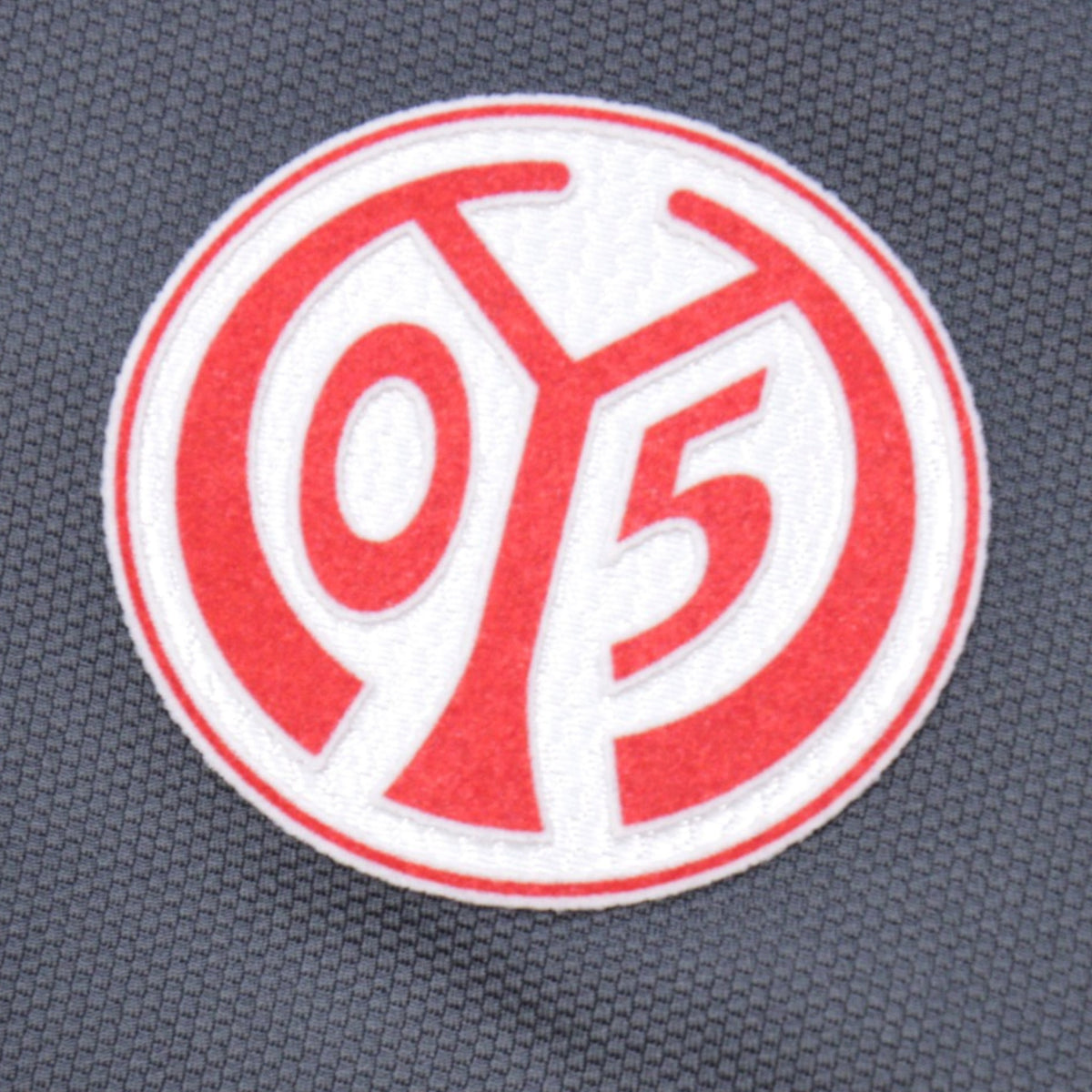 Close-up of the Mainz 05 club crest on the chest