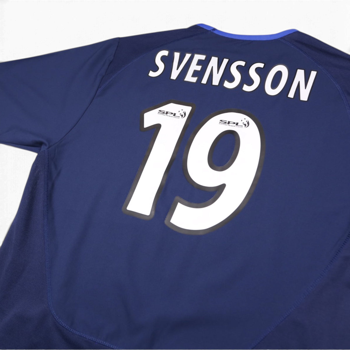 Close-up of Svensson 19 printing with SPL sleeve badges on back