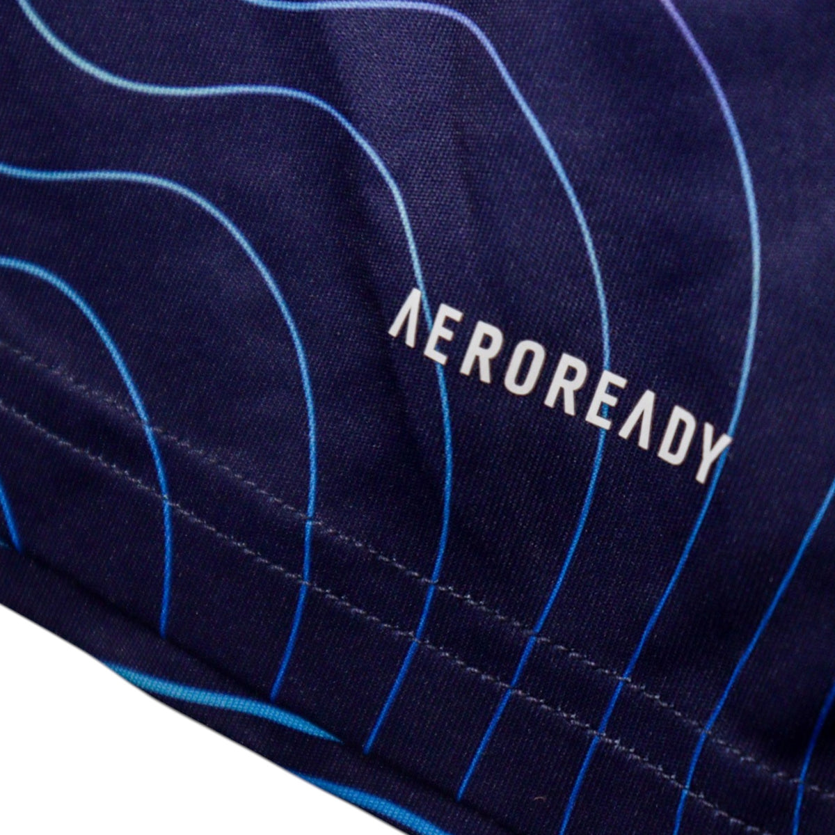 Close-up of AEROREADY print near the hem of the shirt