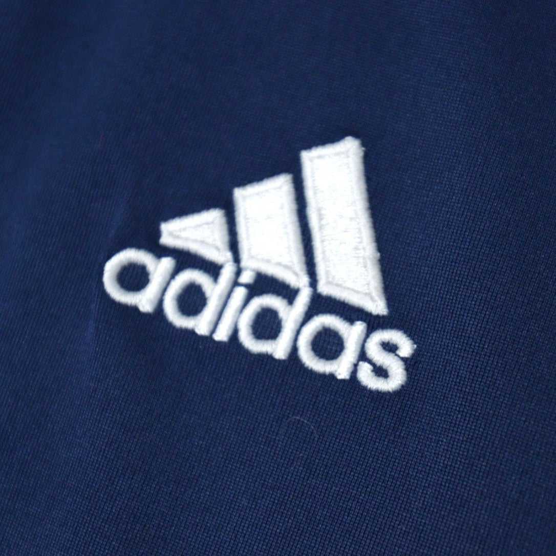 Close-up of the adidas logo embroidery
