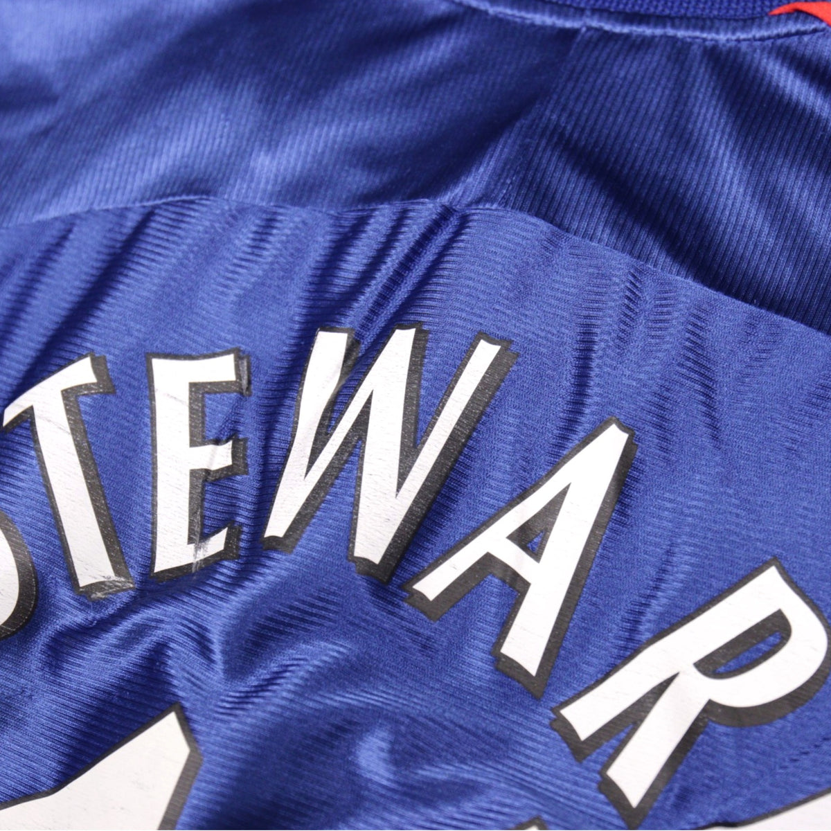 Close-up of the Punch logo and Ipswich Town crest on the shirt
