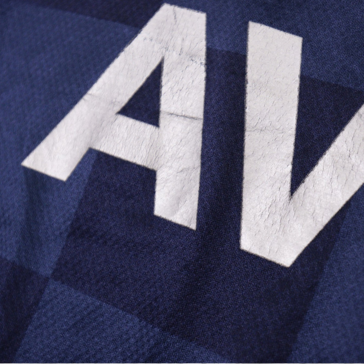 Close-up of cracking on the AVIS sponsor print