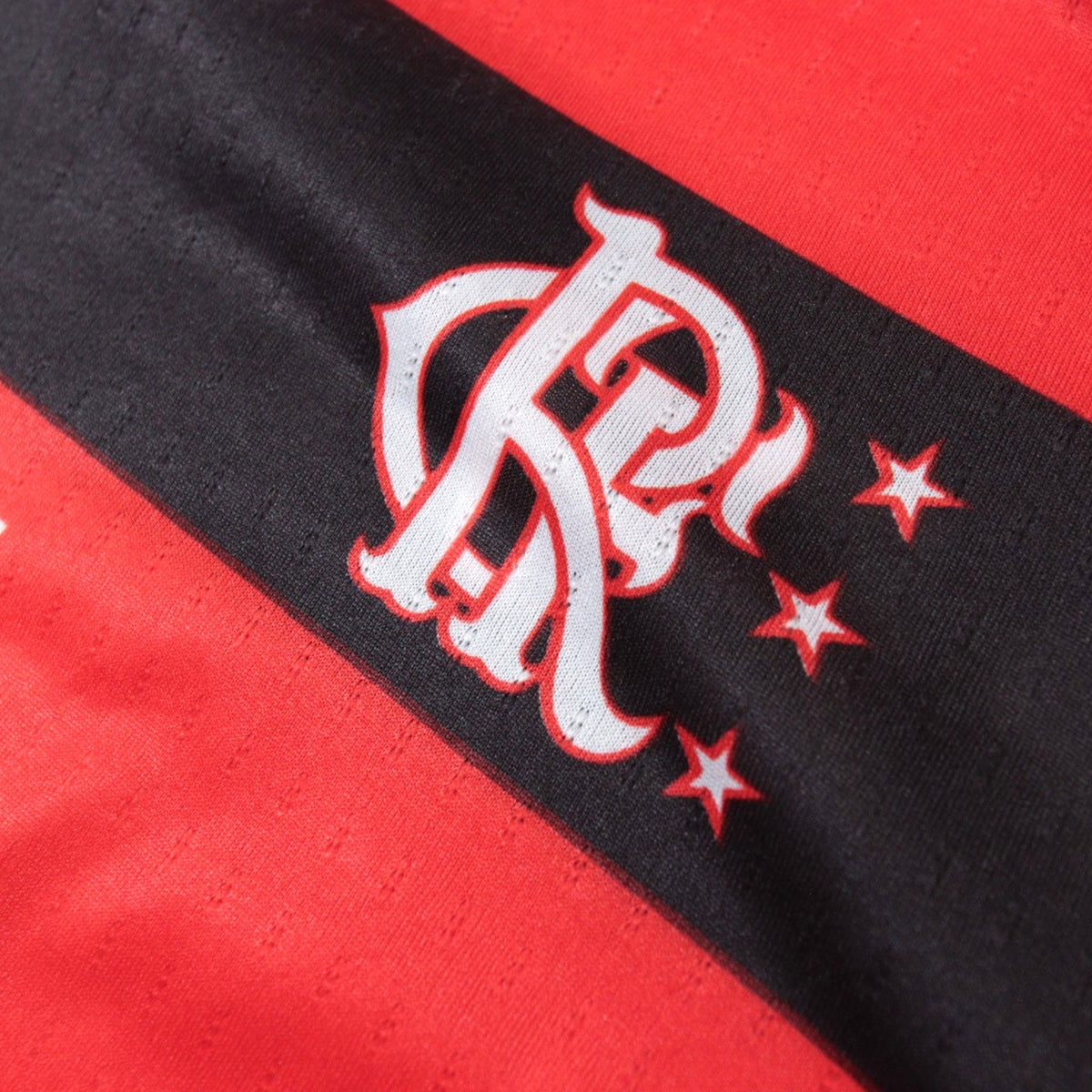 Close-up of the Flamengo crest with three stars on the chest