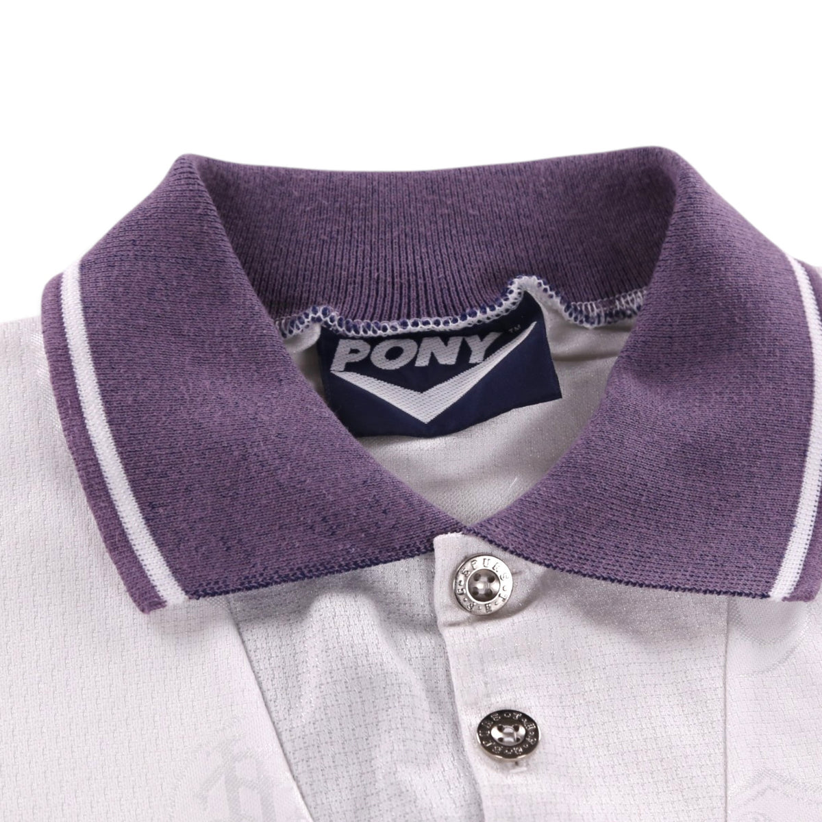Close-up of Pony neck label and collar detail