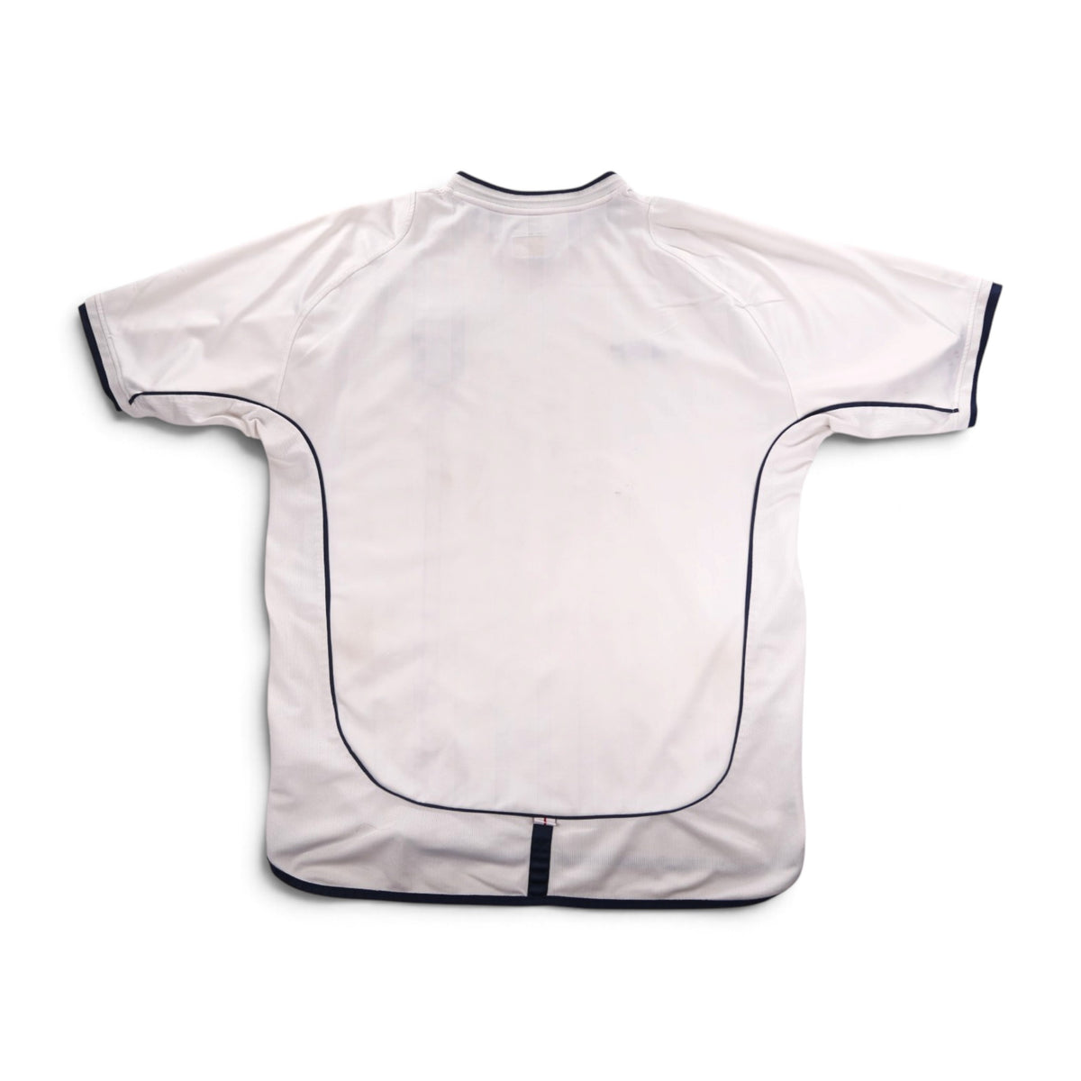 Close-up of back hem with small England flag tab