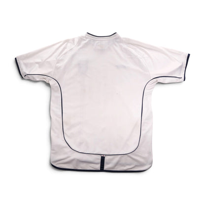 Close-up of back hem with small England flag tab