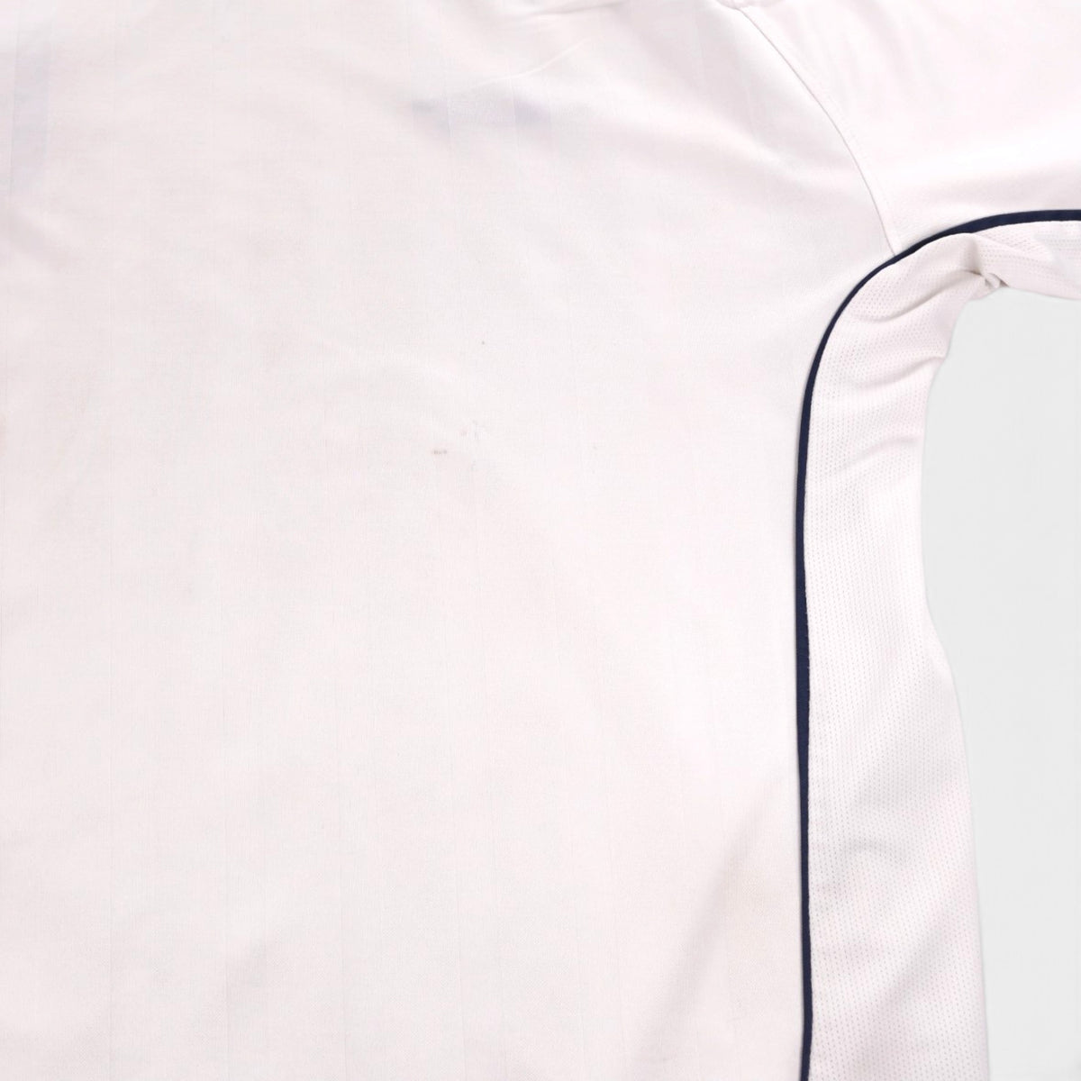 Close-up of marks on the lower front of the shirt