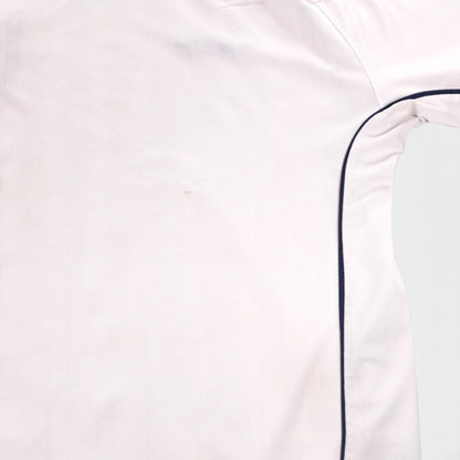 Close-up of marks on the lower front of the shirt