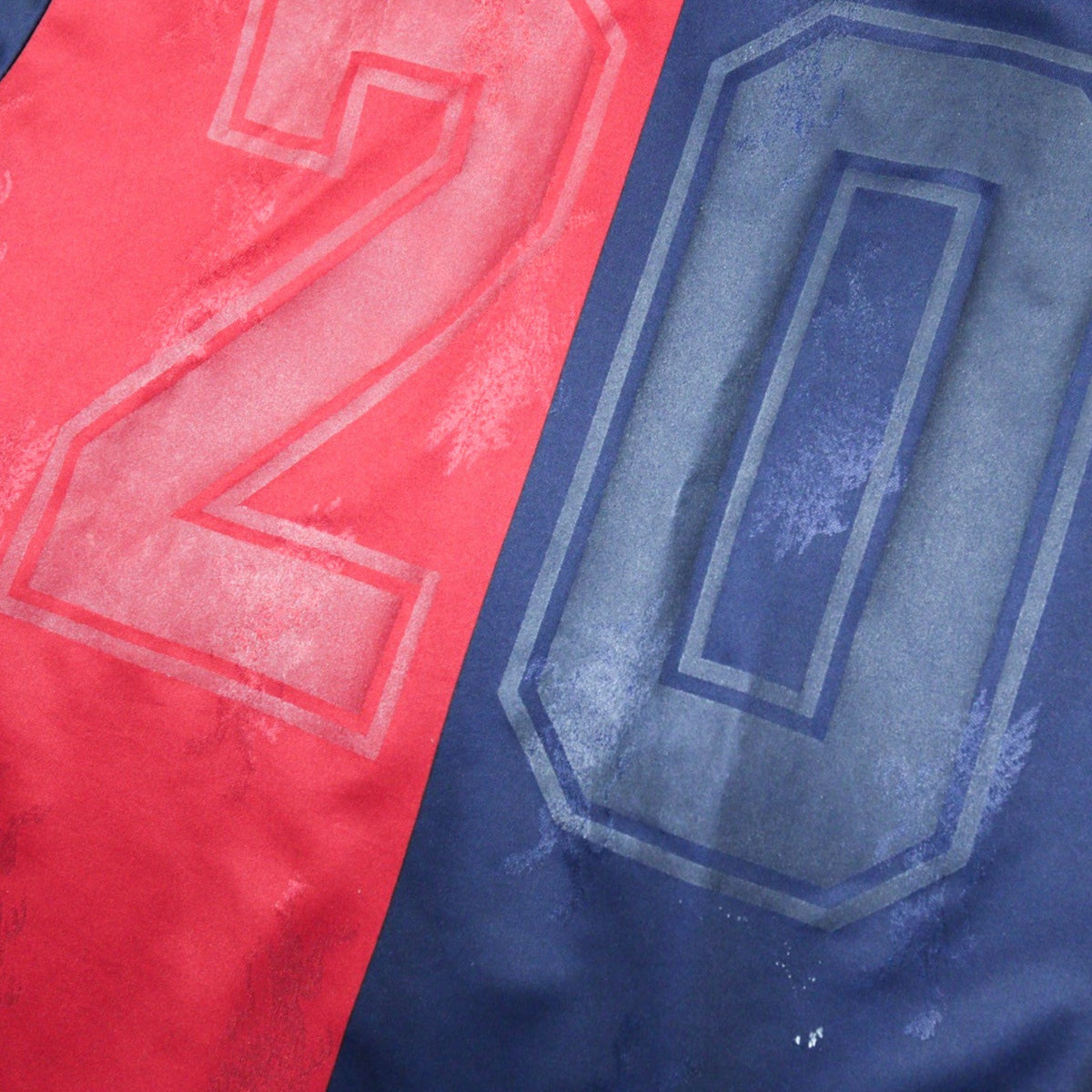 Close-up of the faded number 20 on the back of the shirt