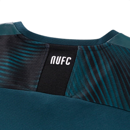 Close-up of NUFC neck tab on Newcastle United away shirt