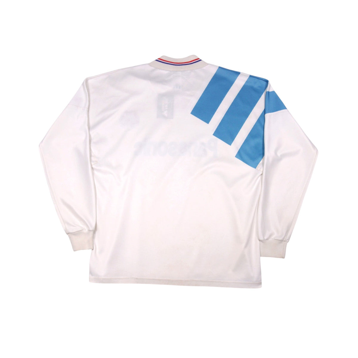 Close-up of the back shoulder panel and collar on the Marseille home shirt