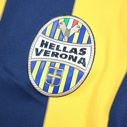 Close-up of the Hellas Verona crest on the shirt