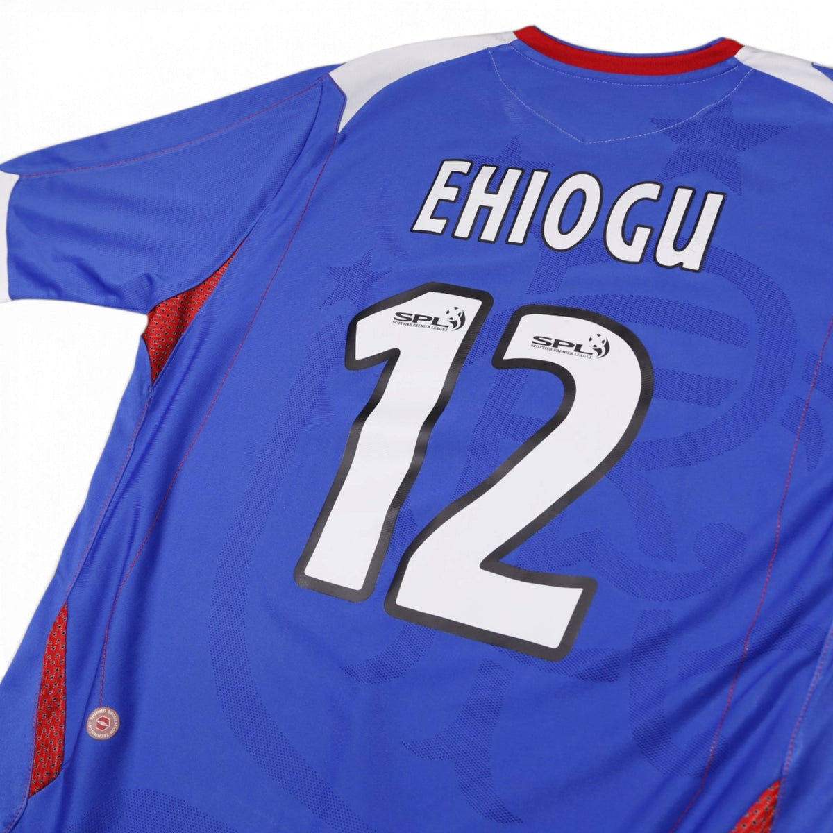 Close-up of Ehiogu 12 name and number print with SPL sleeve patch detail