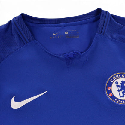 Close-up of the Nike Dri-FIT neck label, ribbed collar and size S tag