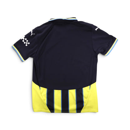 Manchester City 2024/25 away shirt back, showing chequered flag design on the sleeve