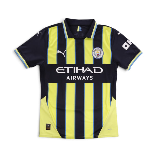 Manchester City 2024/25 away shirt front, navy and yellow striped design with Etihad Airways sponsor