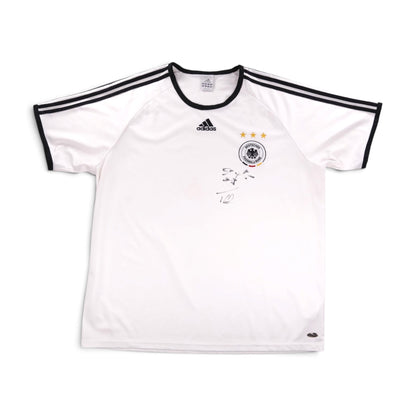 Front view of white Germany 2007/08 adidas training shirt with black trim and signature on chest