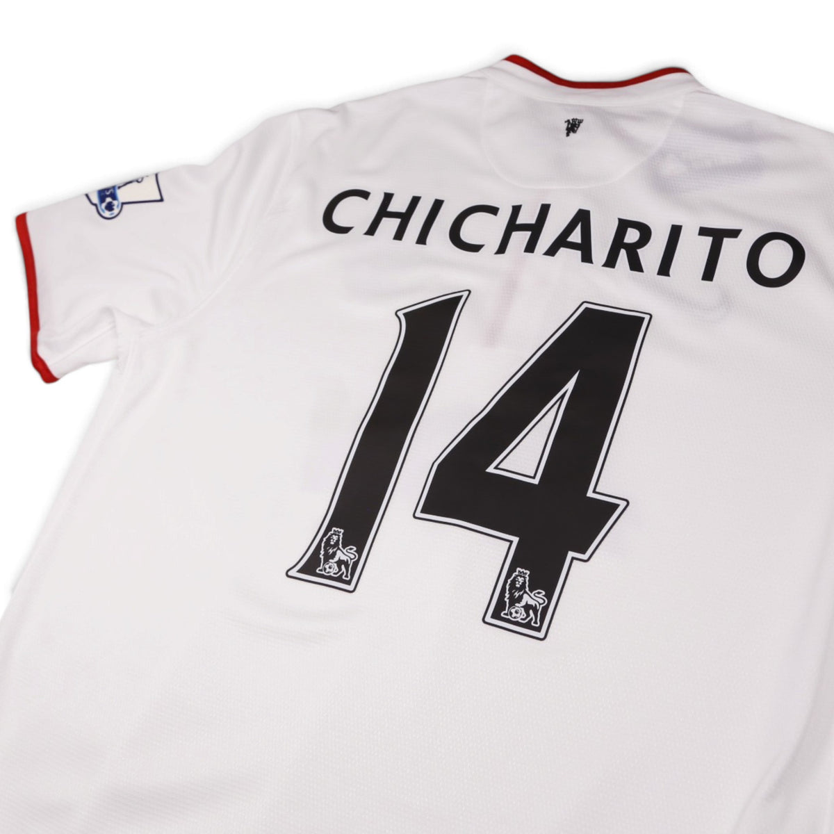 Close-up of Chicharito 14 print on Manchester United away shirt