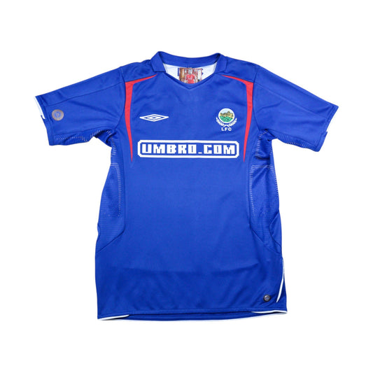 Linfield home shirt front view, blue with red trim and Umbro.com sponsor