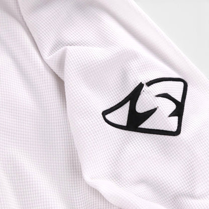 Close-up of the Sportika logo on the shirt sleeve