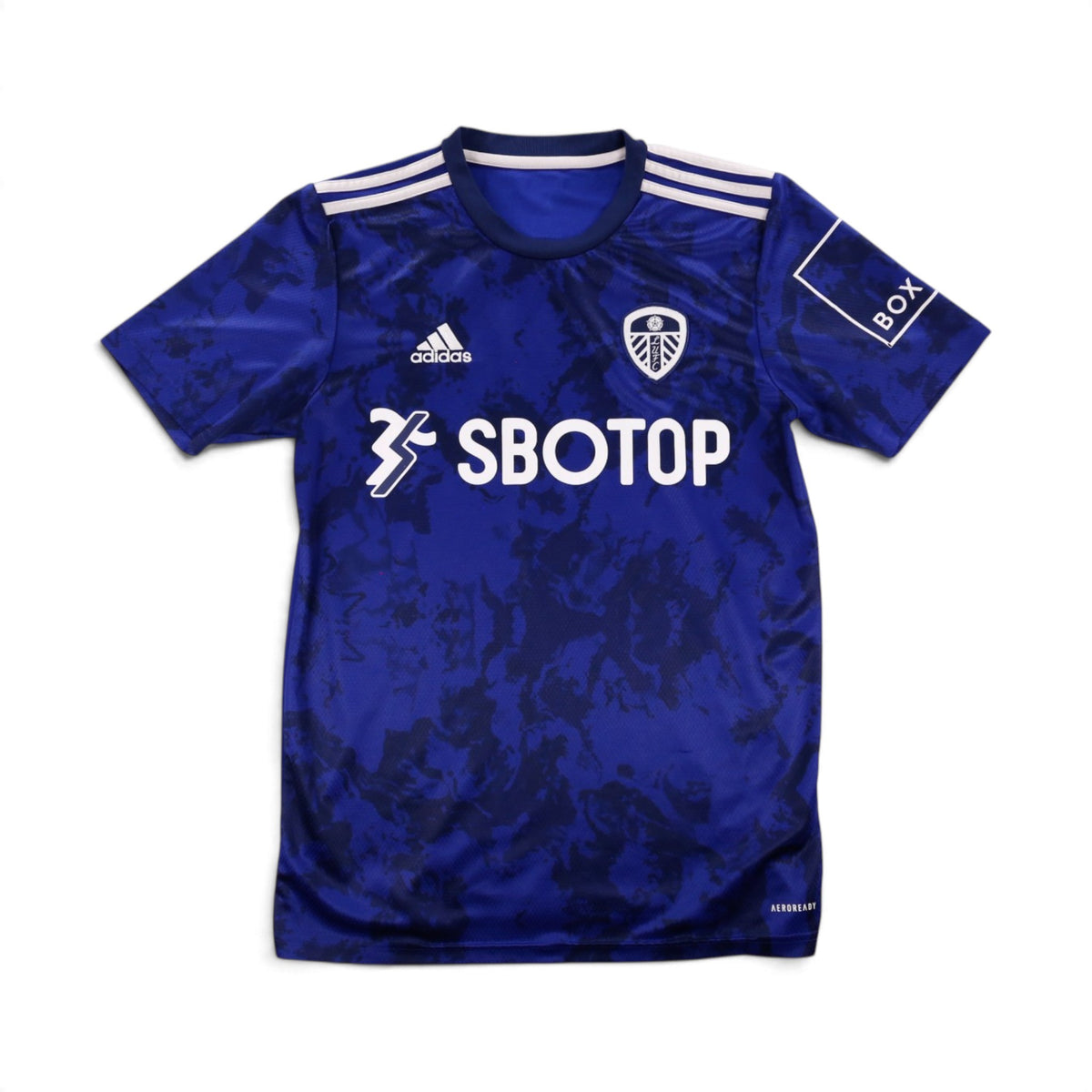 Front view of 2021/22 Leeds United away shirt with SBOTOP sponsor and adidas logo