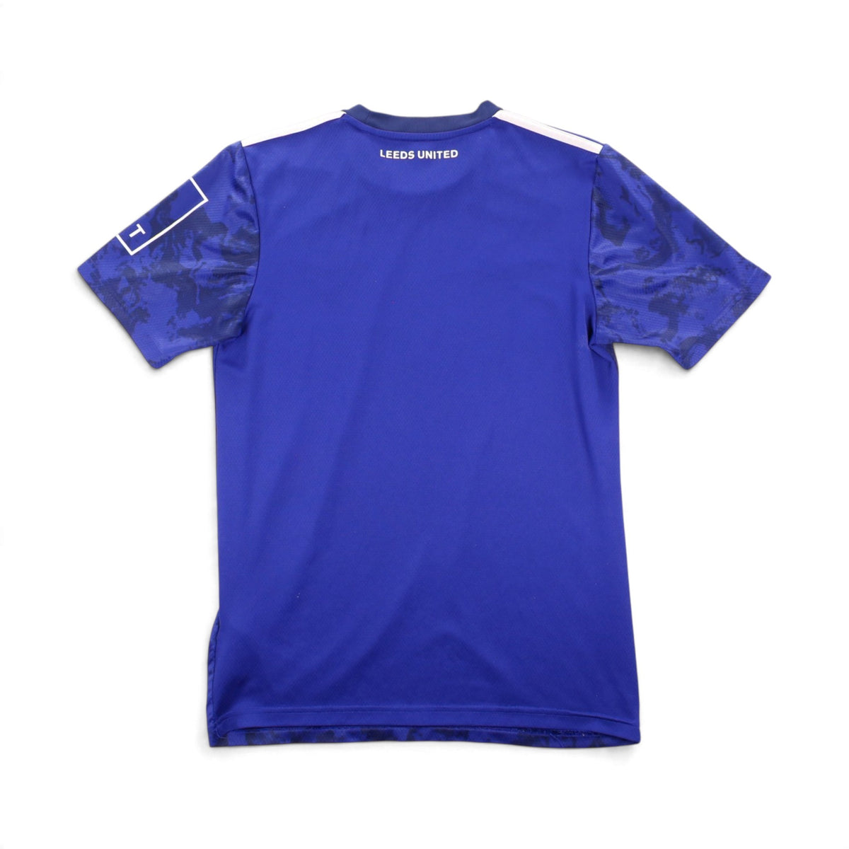 Back view of Leeds United away shirt showing wordmark and sleeve panel
