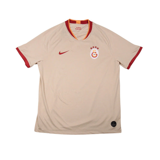 Front view of 2019/20 Galatasaray away shirt by Nike, beige with maroon and orange trim