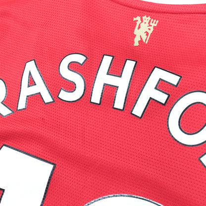 Close-up of Rashford name print and Manchester United crest on the back
