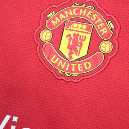 Close-up of embroidered Manchester United crest