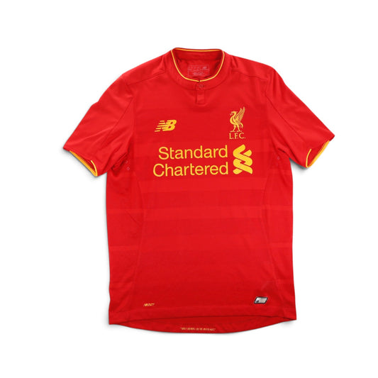 Front view of 2016/17 Liverpool home shirt by New Balance with Standard Chartered sponsor