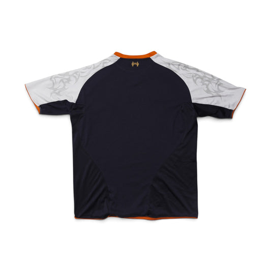 Liverpool 2012-13 third shirt front view, navy with orange trim and Standard Chartered sponsor