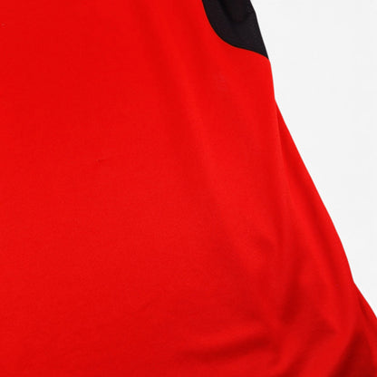 Close-up of red fabric and black sleeve seam on Belgium home shirt