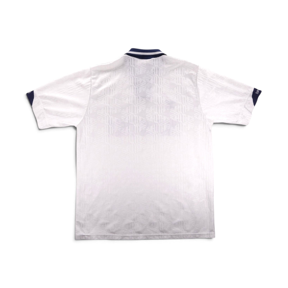 Back of a Tottenham Hotspur home shirt showing jacquard pattern and navy trim