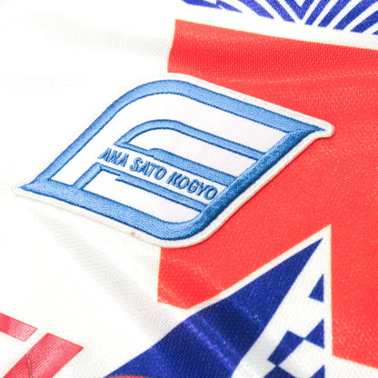 Close-up of the Ana Sato Kogyo crest on the chest