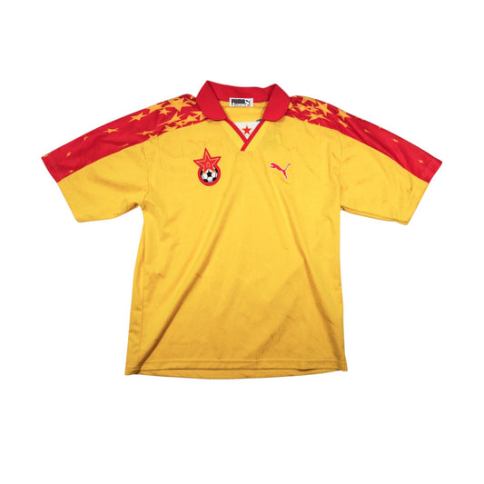 Front of yellow and red Bayi FC home football shirt by Puma