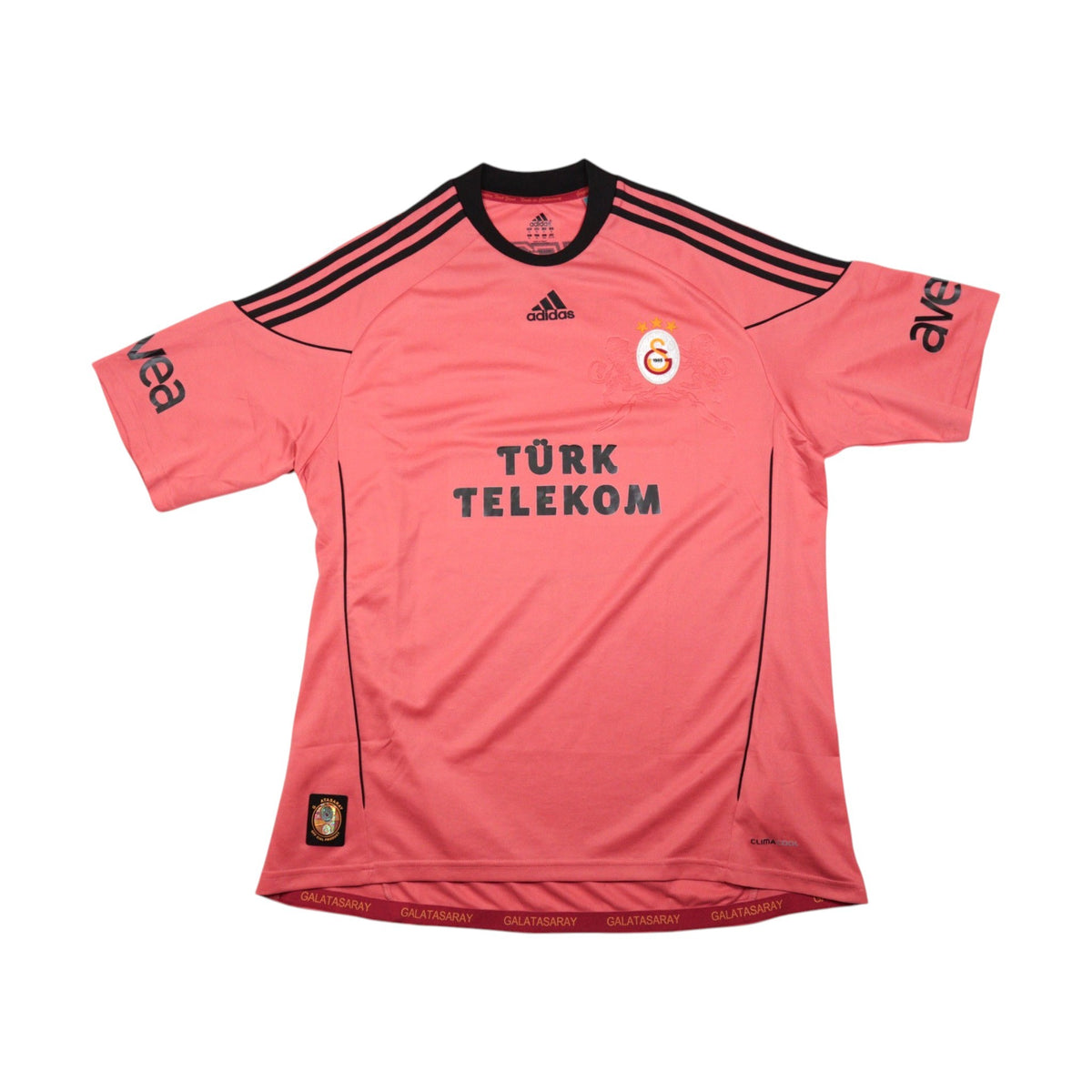 Front of the 2010/11 Galatasaray third shirt in salmon pink with adidas and Türk Telekom branding