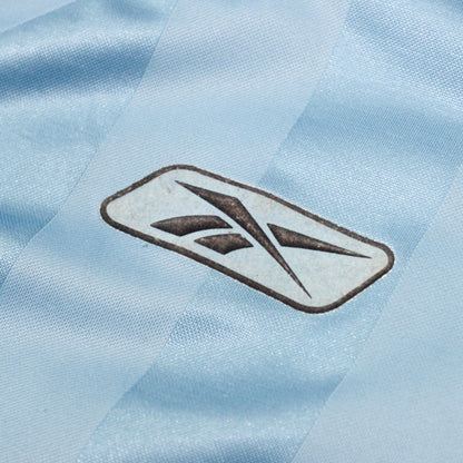 Close-up of the Reebok logo on the chest