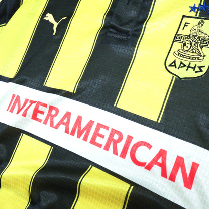 Close-up of Aris Thessaloniki crest and Interamerican sponsor lettering