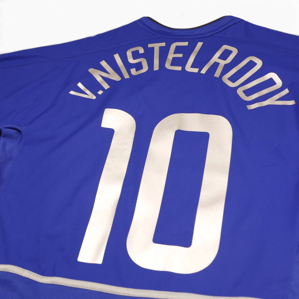 Close-up of V. NISTELRODY number 10 printing on Manchester United third shirt