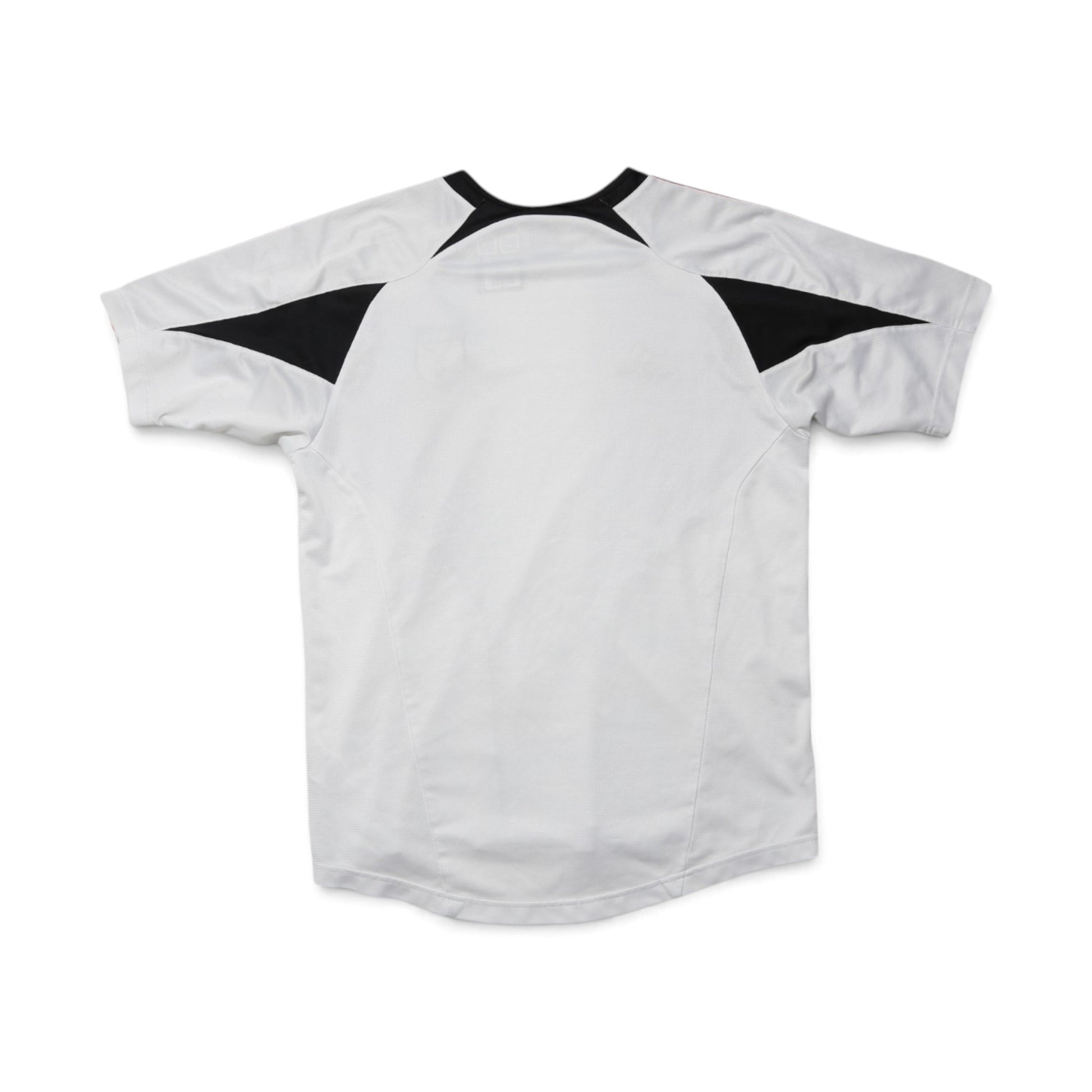 Close-up of DC United training shirt swing tag with price and barcode