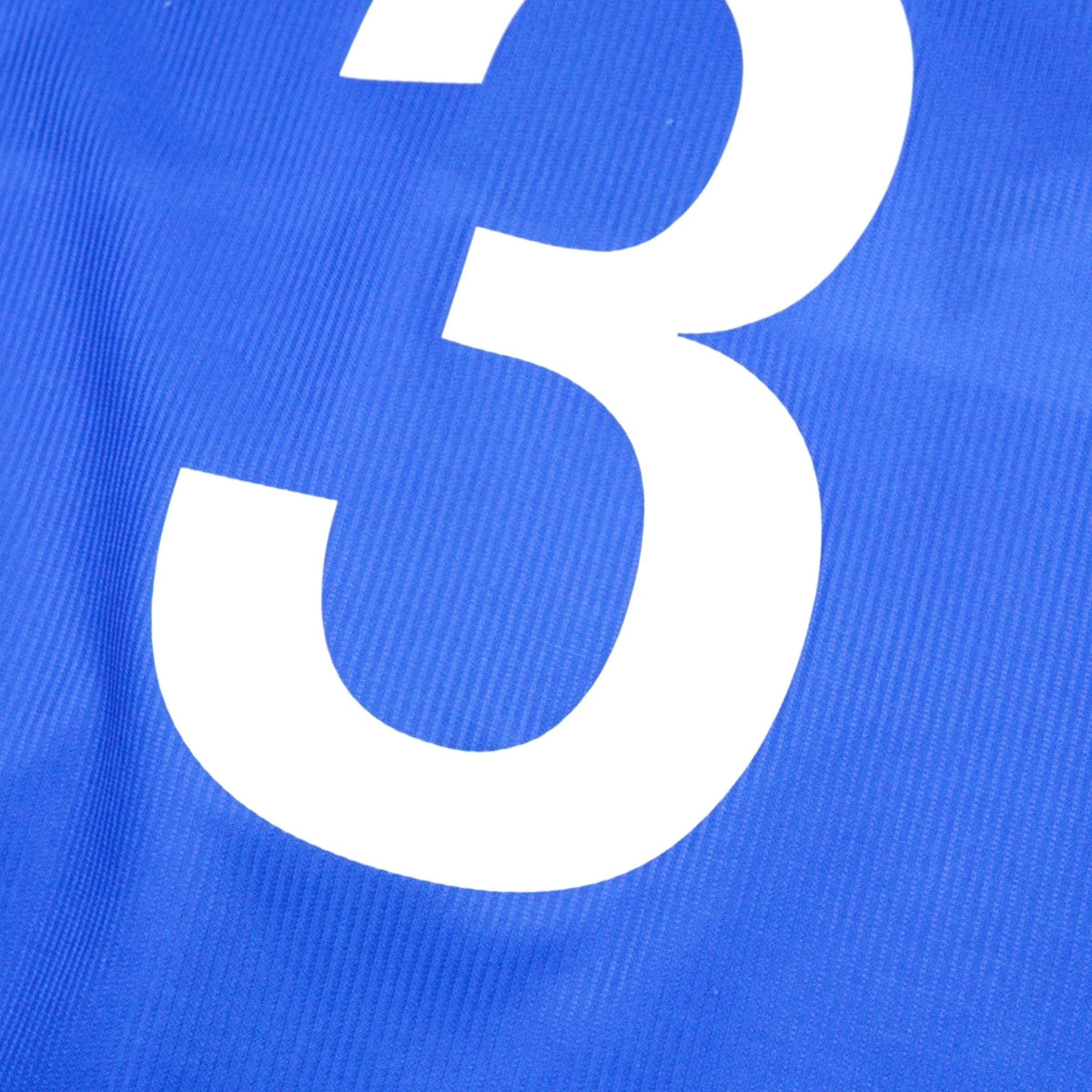 Close-up of the number 3 printed on the back of the shirt