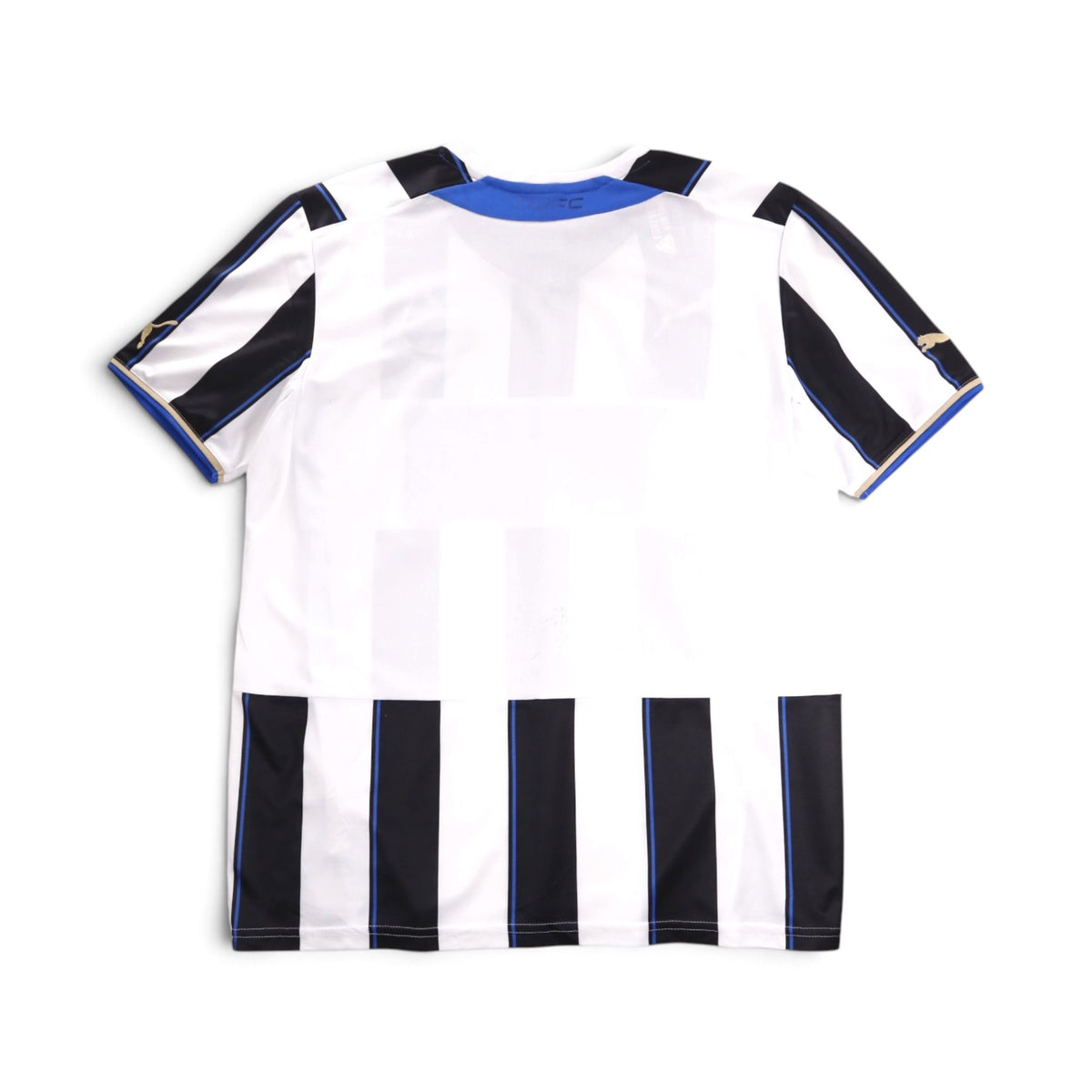 Newcastle United shirt laid flat showing the back stripe pattern and collar.