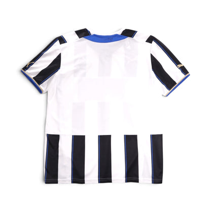 Newcastle United shirt laid flat showing the back stripe pattern and collar.