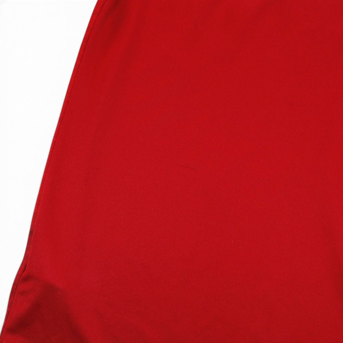Close-up of fabric showing small mark on the hem