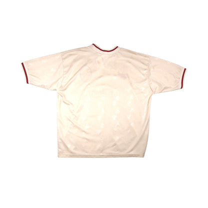 Back view of 1996/97 Liverpool away shirt showing plain cream back with faint mark